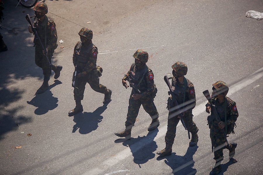 Army move in to disperse protesters during a demonstration in Yangon, Myanmar. Credit: AP Photo