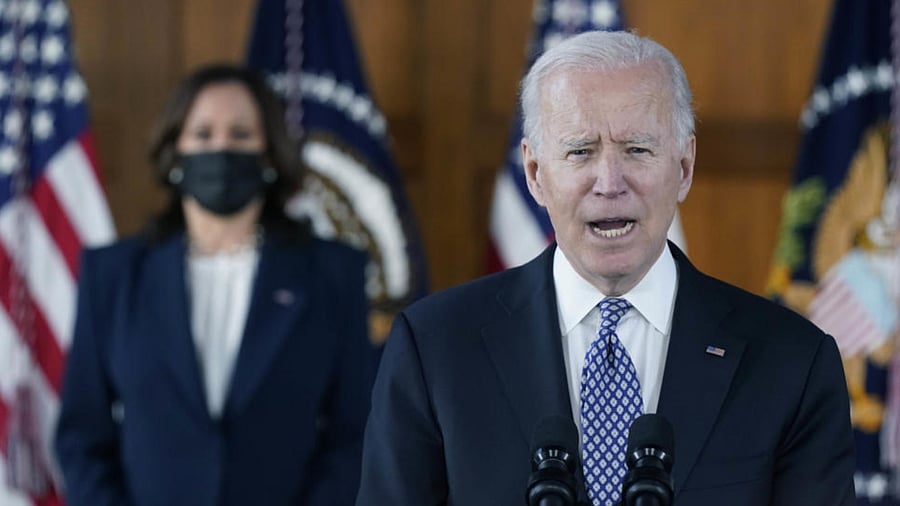 President Joe Biden speaks after meeting with leaders from Georgia's Asian-American and Pacific Islander community, Friday, March 19, 2021, at Emory University in Atlanta, as Vice President Kamala Harris listens. Credit: AP Photo