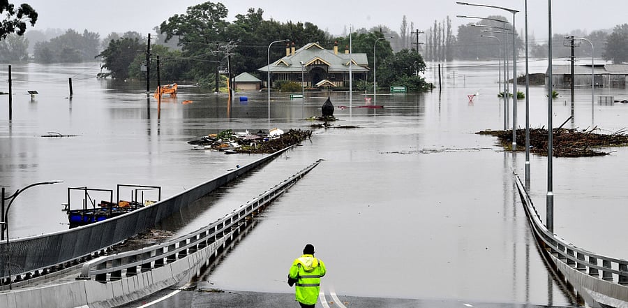 A massive clean-up operation began as sunny skies returned for the first time in days. Credit: AFP Photo
