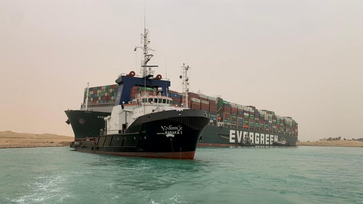 Egypt battles to refloat ship blocking Suez Canal as queues build