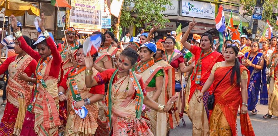 Artists perform during an election campaign rally in support of BJP-AGP alliance candidate from Tezpur constituency Prithiraj Rabha, ahead of the state assembly polls, at Tezpur in Sonitpur district, Thursday, March 25, 2021. Credit: PTI Photo