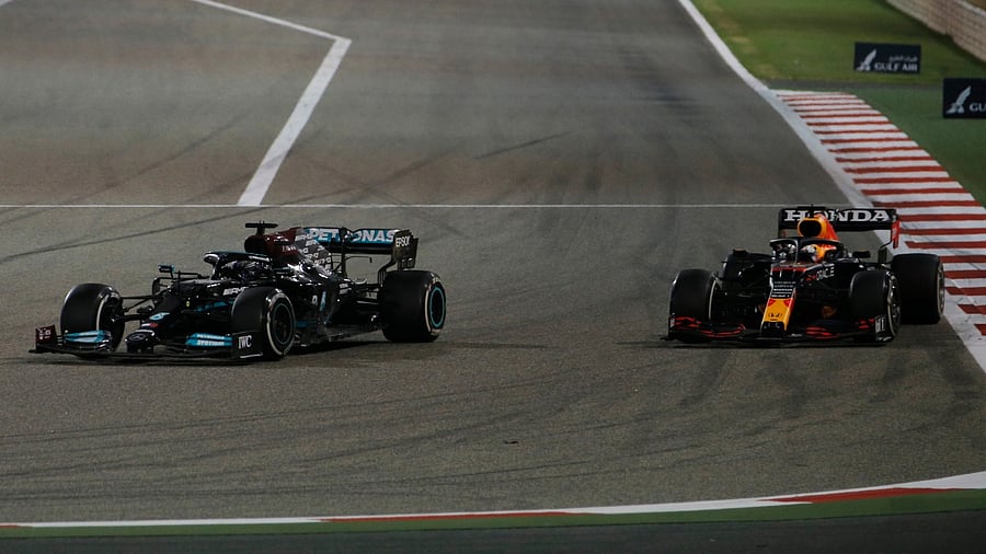 Mercedes' Lewis Hamilton (L) and Red Bull's Max Verstappen battle it out during the season-opening Bahrain Grand Prix. Credit: Reuters Photo