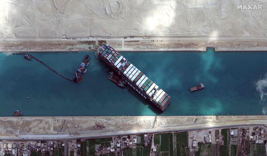 Hope rose on March 28, 2021 that salvage efforts would free a mammoth container ship blocking the Suez Canal for six days, crippling international trade and causing multi-million-dollar losses. Credit: AFP