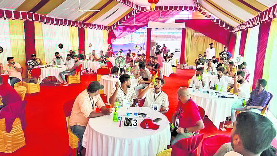 The bidding process of players for the KPL tournament. Credit: DH Photo