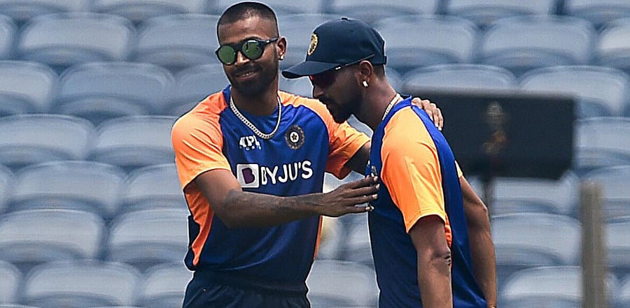 Hardik Pandya (L) and teammate Krunal Pandya. Credit: AFP photo. 