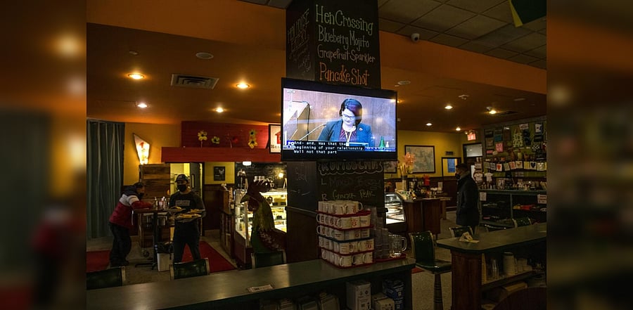 A TV shows a broadcast of the Derek Chauvin murder trial inside a restaurant on April 1, 2021 in Minneapolis, Minnesota. Credit: AFP photo.
