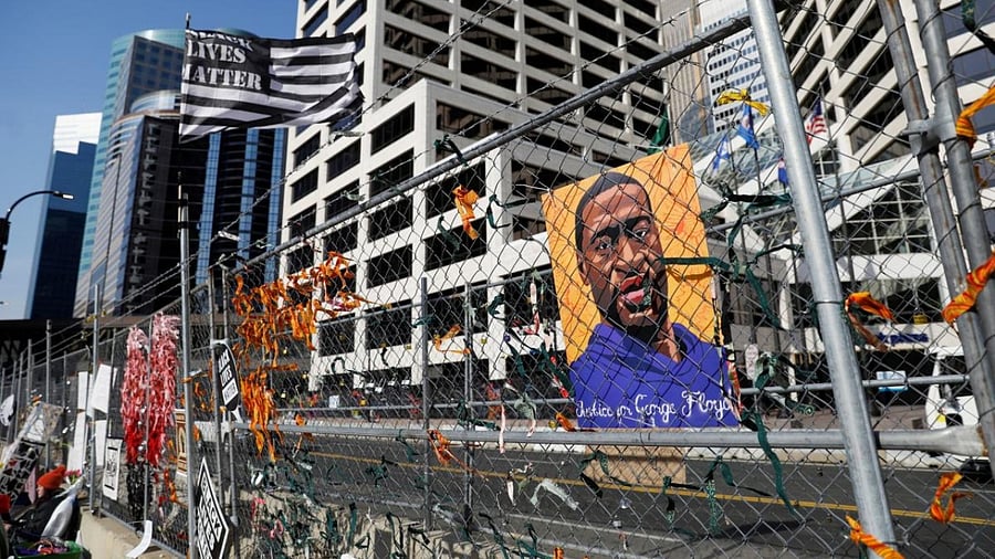 A portrait of George Floyd is seen outside of the Hennepin County Government Center, while the fifth day of trial continues for Derek Chauvin, who is facing murder charges in the death of George Floyd, in Minneapolis, Minnesota. Credit: Reuters.