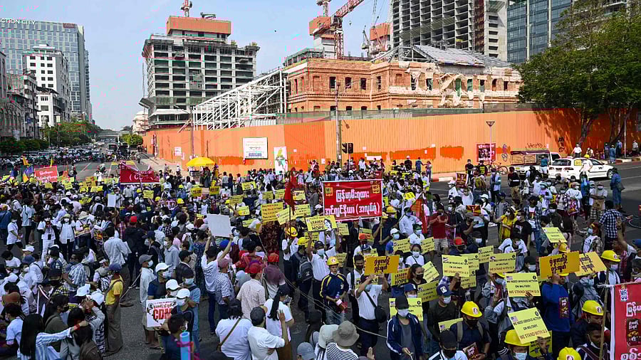 Railway staff members take part in a protest demanding the release of detained civilian leader Aung San Suu Kyi during a demonstration against the military coup in Yangon. Credit: AFP Photo