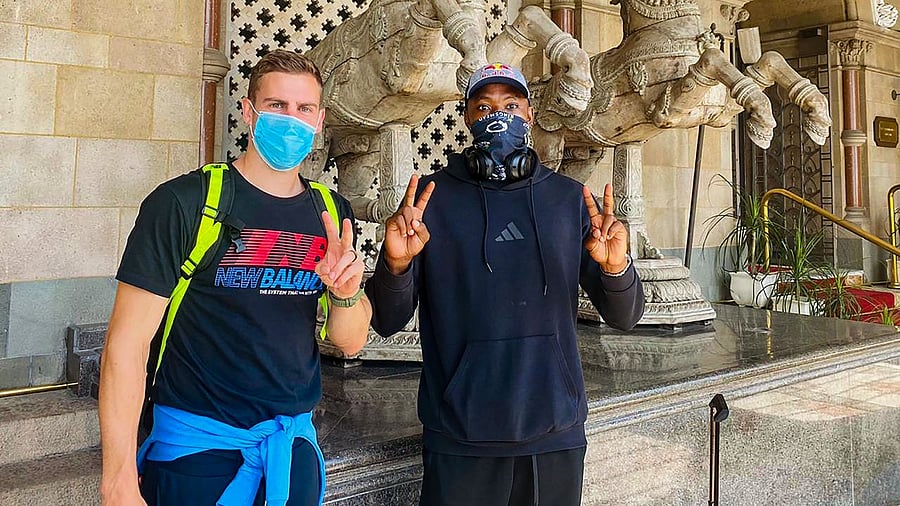 Delhi Capitals' fast bowlers Kagiso Rabada and Anrich Nortje arrive at the team hotel in Mumbai, Tuesday, April 6, 2021. Rabada and Nortje will be in quarantine for one week. Credit: PTI.