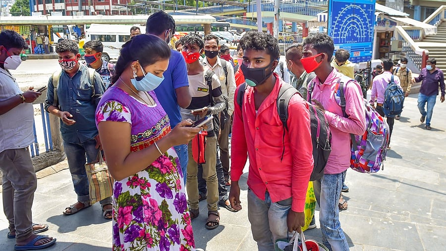 Passengers being registered for Covid-19 tests at KSRTC bus stand, amid surge in coronavirus cases, in Bengaluru. Credit: PTI.