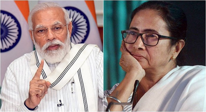 Prime Minister Narendra Modi; West Bengal Chief Minister Mamata Banerjee. Credit: PTI Photo
