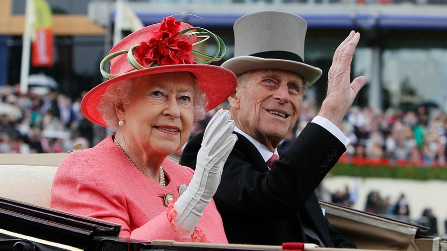 In this Thursday June, 16, 2011 file photo Britain's Queen Elizabeth II with Prince Philip arrive by horse drawn carriage in the parade ring on the third day, traditionally known as Ladies Day, of the Royal Ascot horse race meeting at Ascot, England. Credit: AP/PTI file photo.
