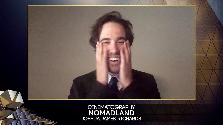 Joshua James Richards receives Cinematography BAFTA award for "Nomadland", during the 74th British Academy Film Awards in London. Credit: Reuters Photo