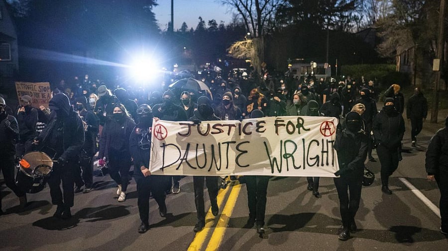 Activists march towards the Multnomah County Sheriff's office during a protest against the killing of Daunte Wright on April 12, 2021 in Portland, Oregon. Credit: AFP photo.