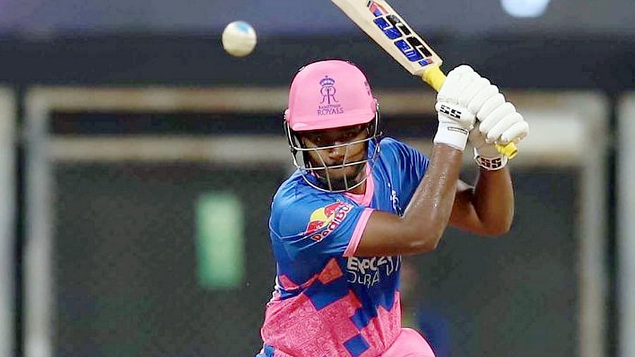 Sanju Samson hits a shot in the IPL match against Punjab Kings. Credit: PTI Photo