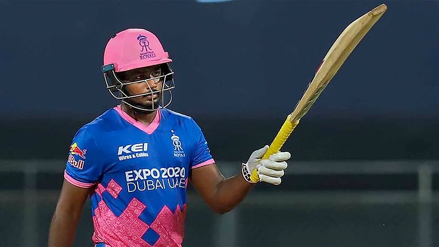 Sanju Samson celebrates after hitting a ton. Credit: PTI Photo