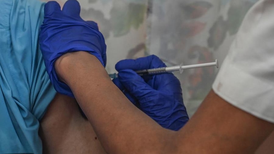 A man gets inoculated with a dose of the Covishield, AstraZeneca-Oxford's Covid-19 coronavirus vaccine at the Saifee Hospital after vaccinations restarted at all city private hospitals, in Mumbai. Credit: AFP Photo