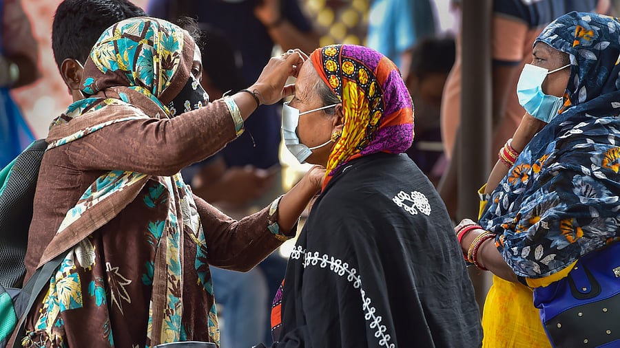 Authorities will further intensify Covid-19 rules in airports, bus stands and railway stations. Credit: PTI Photo