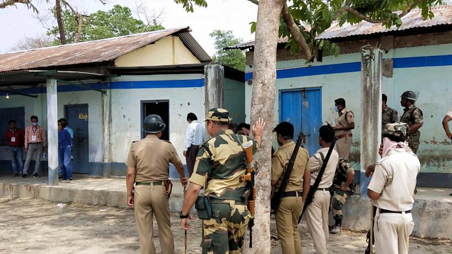 Security personnel keep vigil at a polling station after Election Commission ordered of stopping the voting exercise at polling station number 126 in Sitalkuchi, where clashes erupted between locals and central forces, at Sitalkuchi in Cooch Behar district, Saturday, April 10, 2021. Credit: PTI Photo