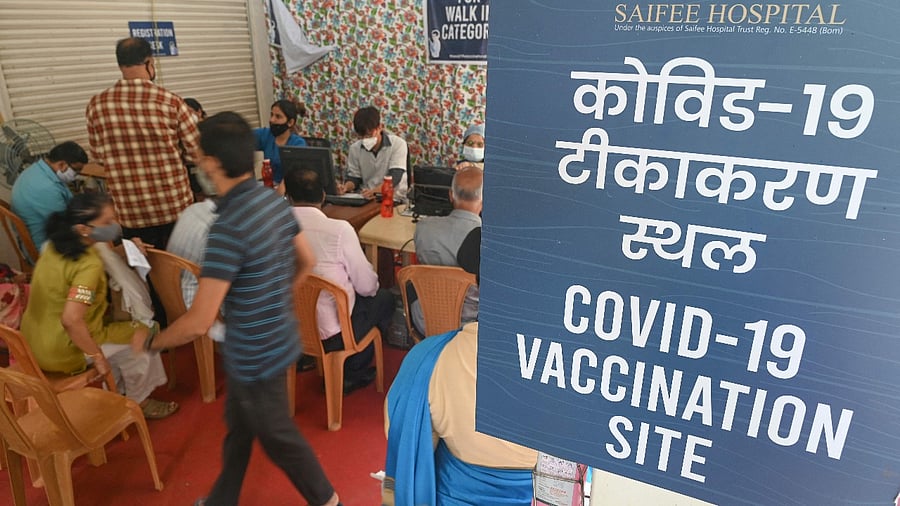 People register to get a dose of the Covishield, AstraZeneca-Oxford's Covid-19 coronavirus vaccine at the Saifee Hospital after vaccinations restarted at all city private hospitals, in Mumbai. Credit: AFP photo