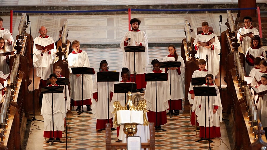 The chorus sing during an evensong at Peterborough Cathedral, after Britain's Prince Philip, husband of Queen Elizabeth, died at the age of 99, in Peterborough, Britain, April 16, 2021. Credit: Reuters Photo