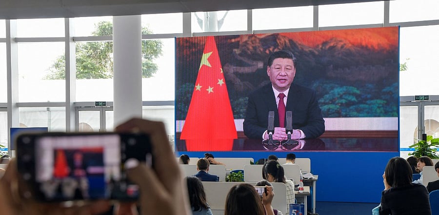 Xi also pledged to continue to open the Chinese economy for foreign businesses. Credit: AFP Photo