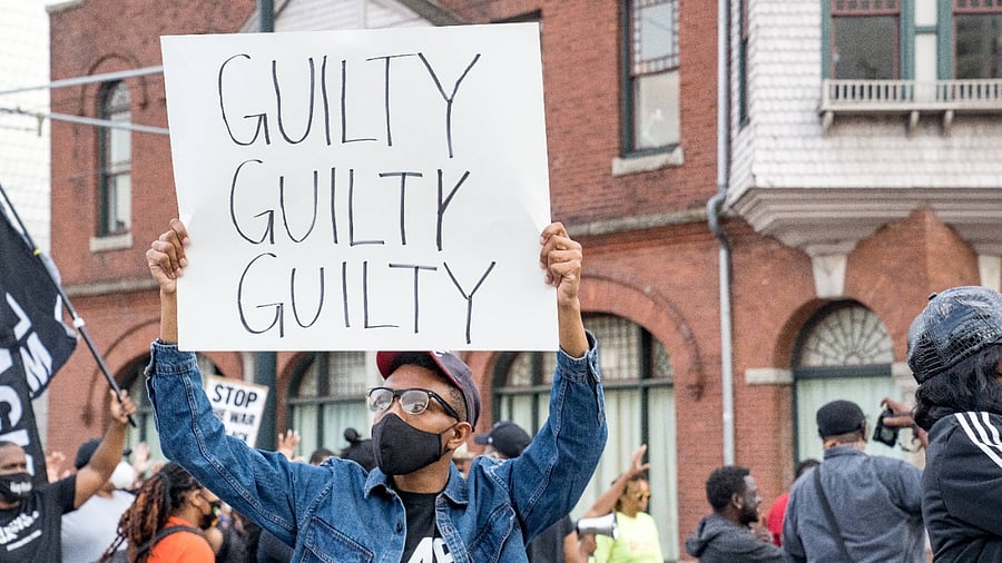 People march through the streets after the verdict was announced for Derek Chauvin in Atlanta, United States. Credit: AFP Photo