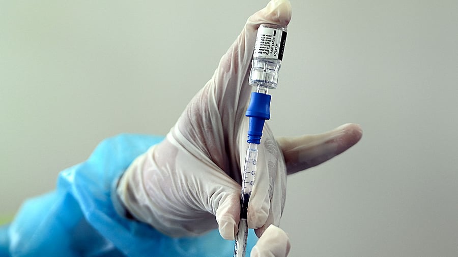 A nurse prepares a dose of the Pfizer-BioNTech vaccine against Covid-19. Credit: AFP Photo