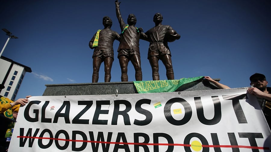 Manchester United fans protest against owners after failed launch of a European Super League. Credit: Reuters Photo
