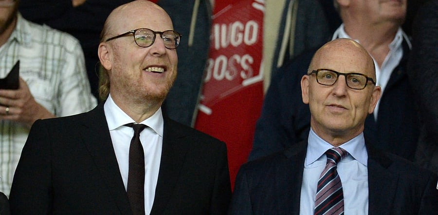 Manchester United's US co-chairmen Joel Glazer (R) and Avram Glazer (L). Credit: AFP Photo