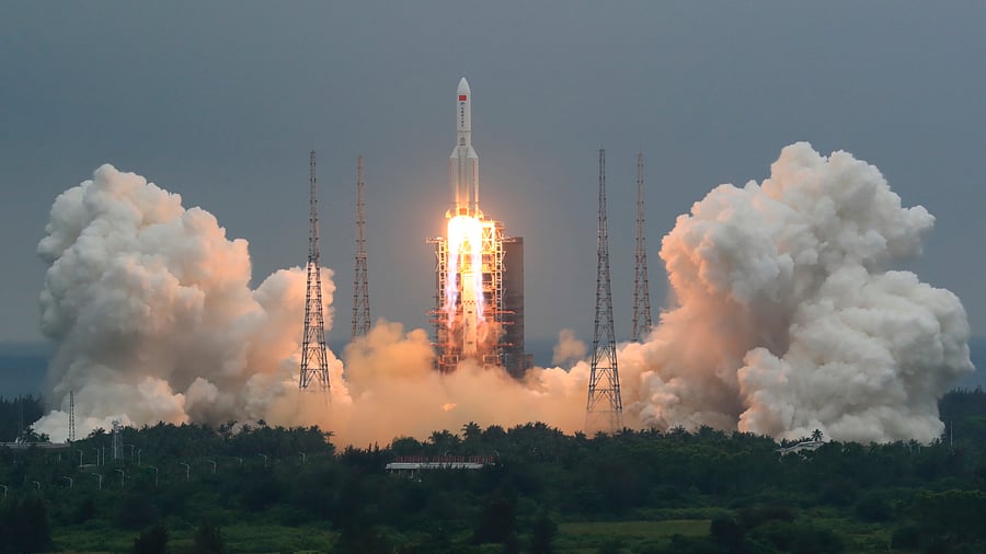 China's Xinhua News Agency, a Long March 5B rocket carrying a module for a Chinese space station lifts off from the Wenchang Spacecraft Launch Site in Wenchang. Credit: AP Photo