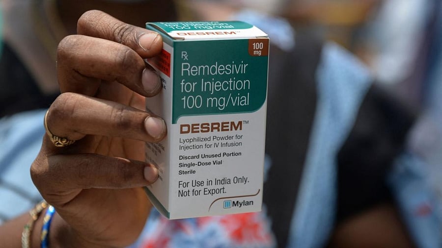 A woman holds a box of Remdesivir, an antiviral drug used to treat Covid-19 symptoms. Credit: AFP Photo