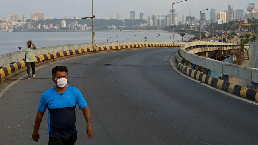 Maharashtra, which has so far reported 45,39,553 coronavirus cases and 67,985 fatalities, is under lockdown- like restrictions till May 15.  Credit: AFP File Photo