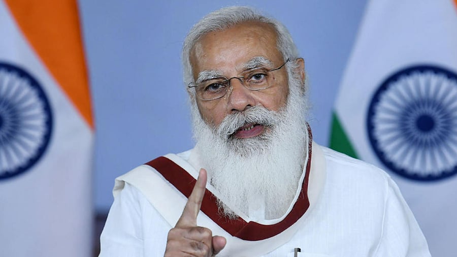 The blind faith of the people in God is now accompanied by blind faith in India’s most popular leader of contemporary times: Narendra Modi. Credit: PTI Photo