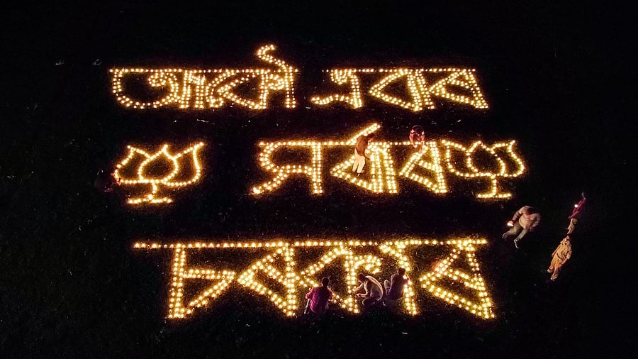 People light earthen lamps after BJP's win in the Assam Assembly Elections in Majuli district, Sunday, May 2, 2021. Credit: PTI Photo