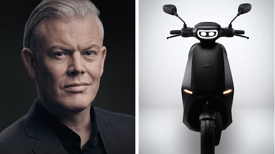 Wayne Burgess and a design concept of the Ola scooter. Credit: DH Photo