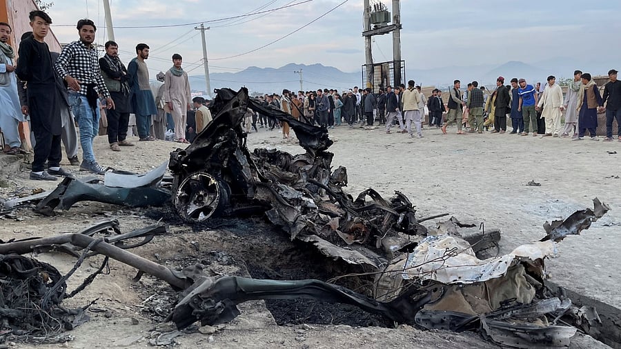 People stand at the site of a blast in Kabul, Afghanistan May 8, 2021. Credit: Reuters Photo