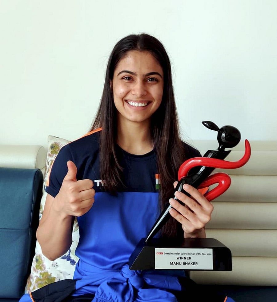 Manu Bhaker poses for photographs with the BBC Indian Emerging Player of the Year award. The 19-year-old was the youngest Indian to clinch the women's 10m air pistol gold at the Shooting World Cup in 2018. Credit: PTI