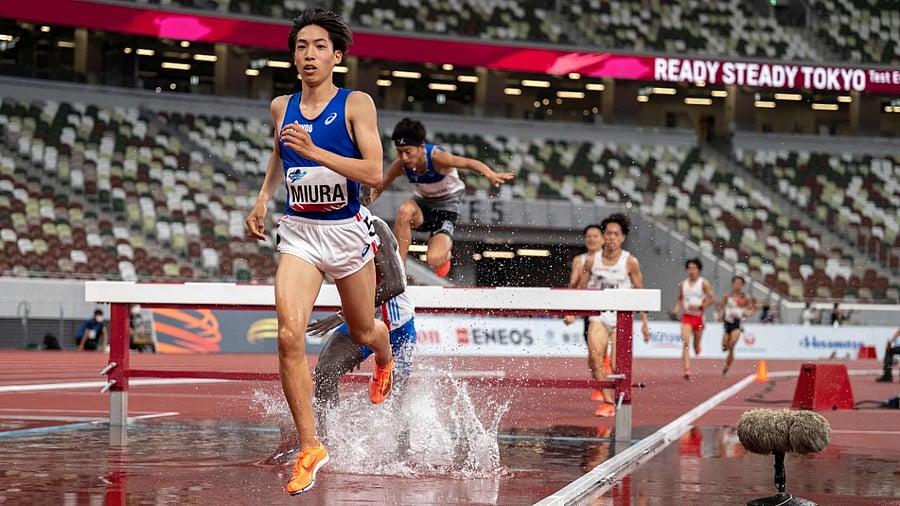 Ryuji Miura of Japan competes and sets a national record in the men's 3000m steeple-chase during an athletics test event for the Tokyo Olympics at the National Stadium in Tokyo on May 9, 2021. Credit: AFP Photo