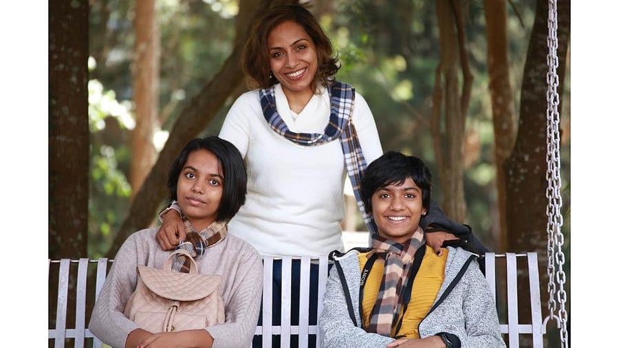 Capt Ranjana Velu with her daughters.