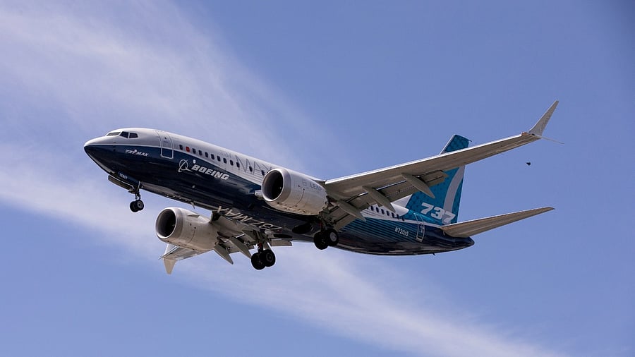 A Boeing 737 MAX airplane lands after a test flight at Boeing Field in Seattle, Washington. Credit: Reuters File Photo