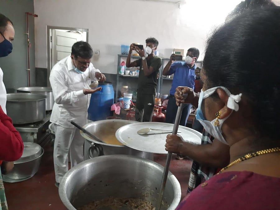 Madikeri MLA Appachu Ranjan M P checks the quality of food provided to Covid-19 patients at the Designated Covid-19 Hospital in Madikeri.