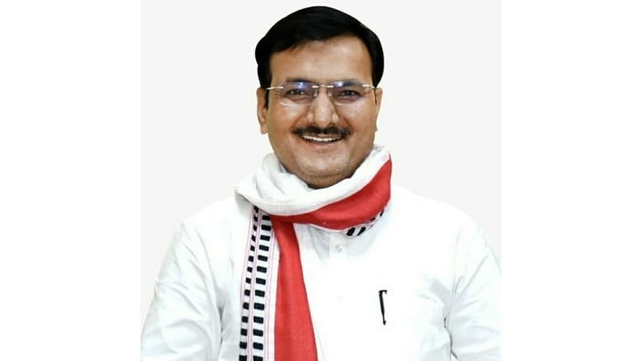 Brother of Uttar Pradesh minister for basic education Satish Dwivedi was appointed assistant professor at the state university under the EWS quota. Credit: Twitter Photo/@drdwivedisatish