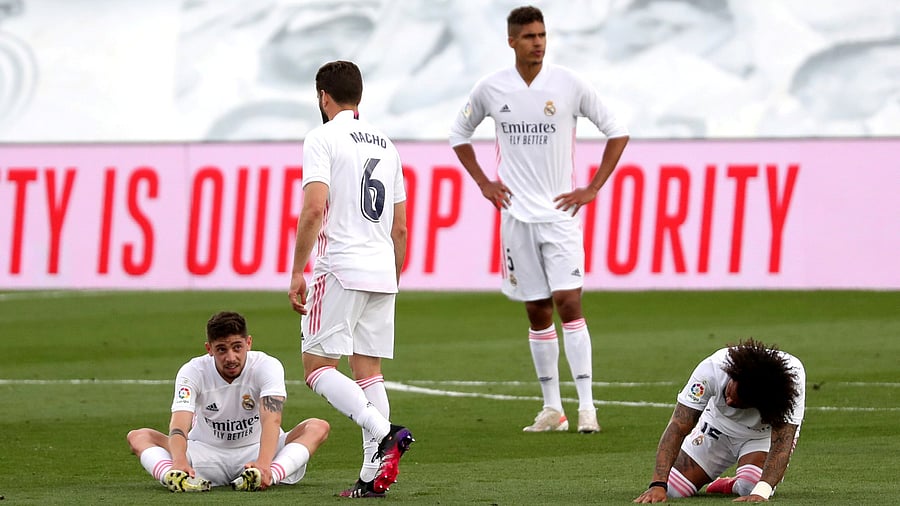 Real Madrid's Marcelo with teammates react after the match. Credit: Reuters Photo