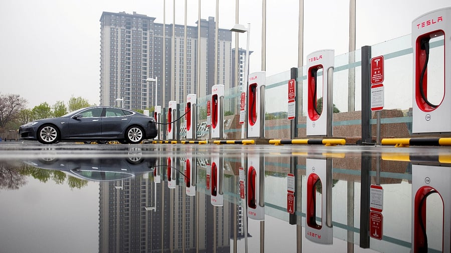 A Tesla car pictured at a charging point in Beijing. Credit: Reuters File Photo