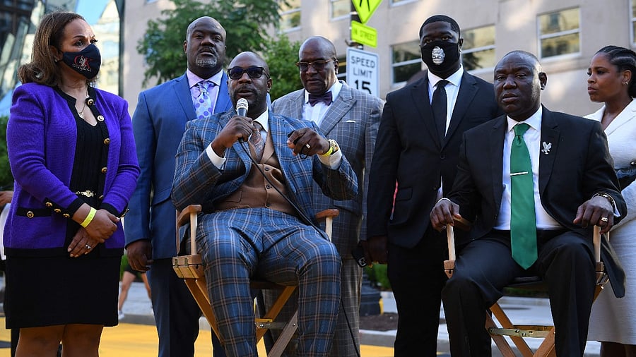George Floyd's brother Philonise Floyd (3L) speaks to the media on Black Lives Matter plaza after a meeting at the White House with US President Joe Biden in Washington, DC. Credit: AFP Photo