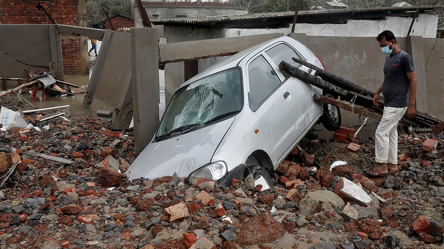Waves the size of double-decker buses pounded the shore and swamped towns and villages along the coastline. Credit: Reuters Photo