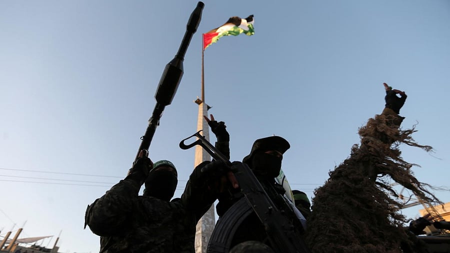 Palestinian Hamas militants attend an anti-Israel rally in Khan Younis, in the southern Gaza Strip May 27, 2021. Credit: Reuters Photo