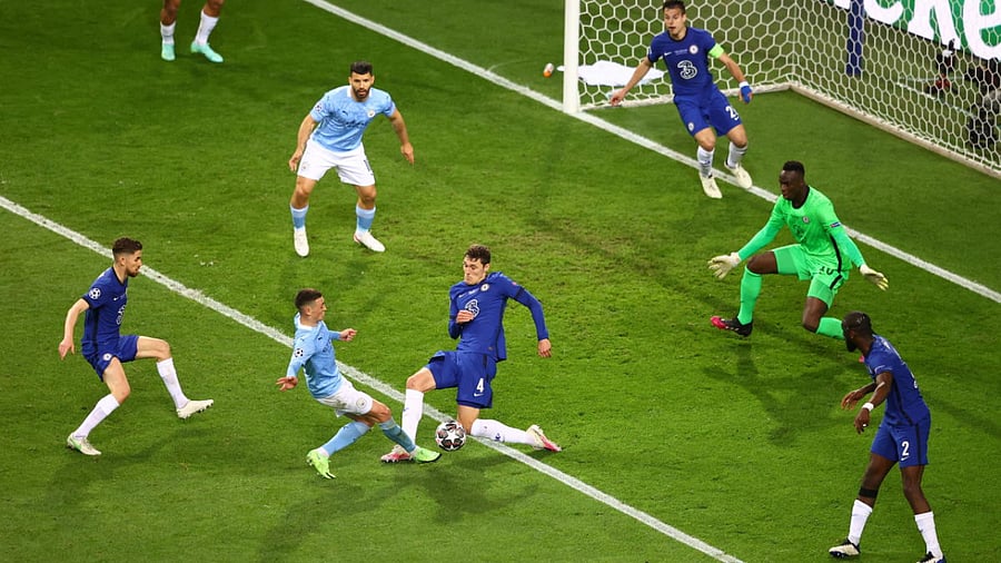 Chelsea's Andreas Christensen in action with Manchester City's Phil Foden. Credit: Reuters Photo