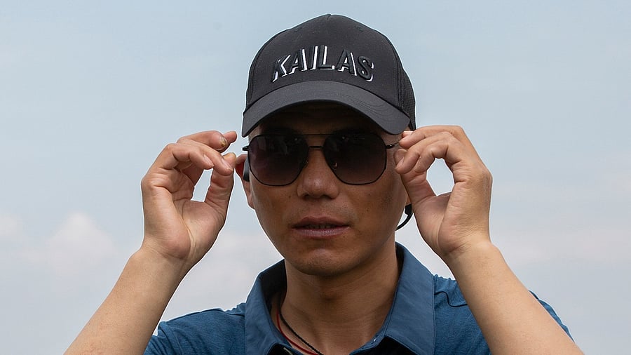 Zhang Hong, 44, is also the third blind climber internationally to reach the world's highest peak. Credit: AP Photo